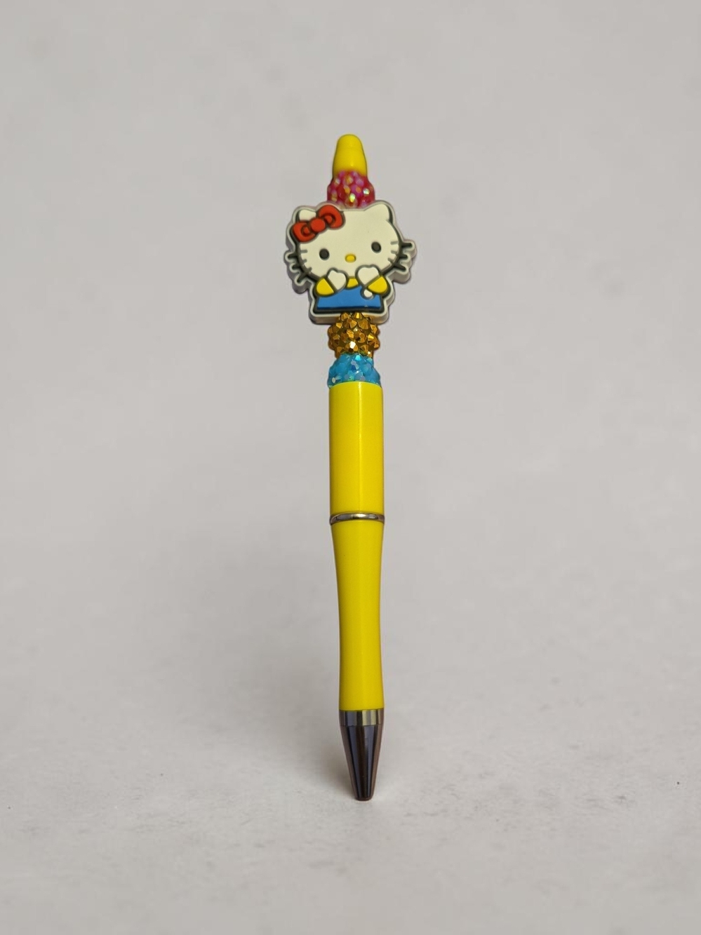 Hello Kitty Bright Yellow Decorative Kids Pen with Multicolor Topper